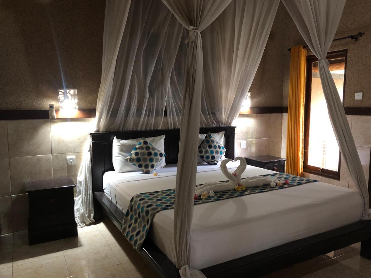 Pondok Shindu Guest House เปมูเตรัน ภายนอก รูปภาพ