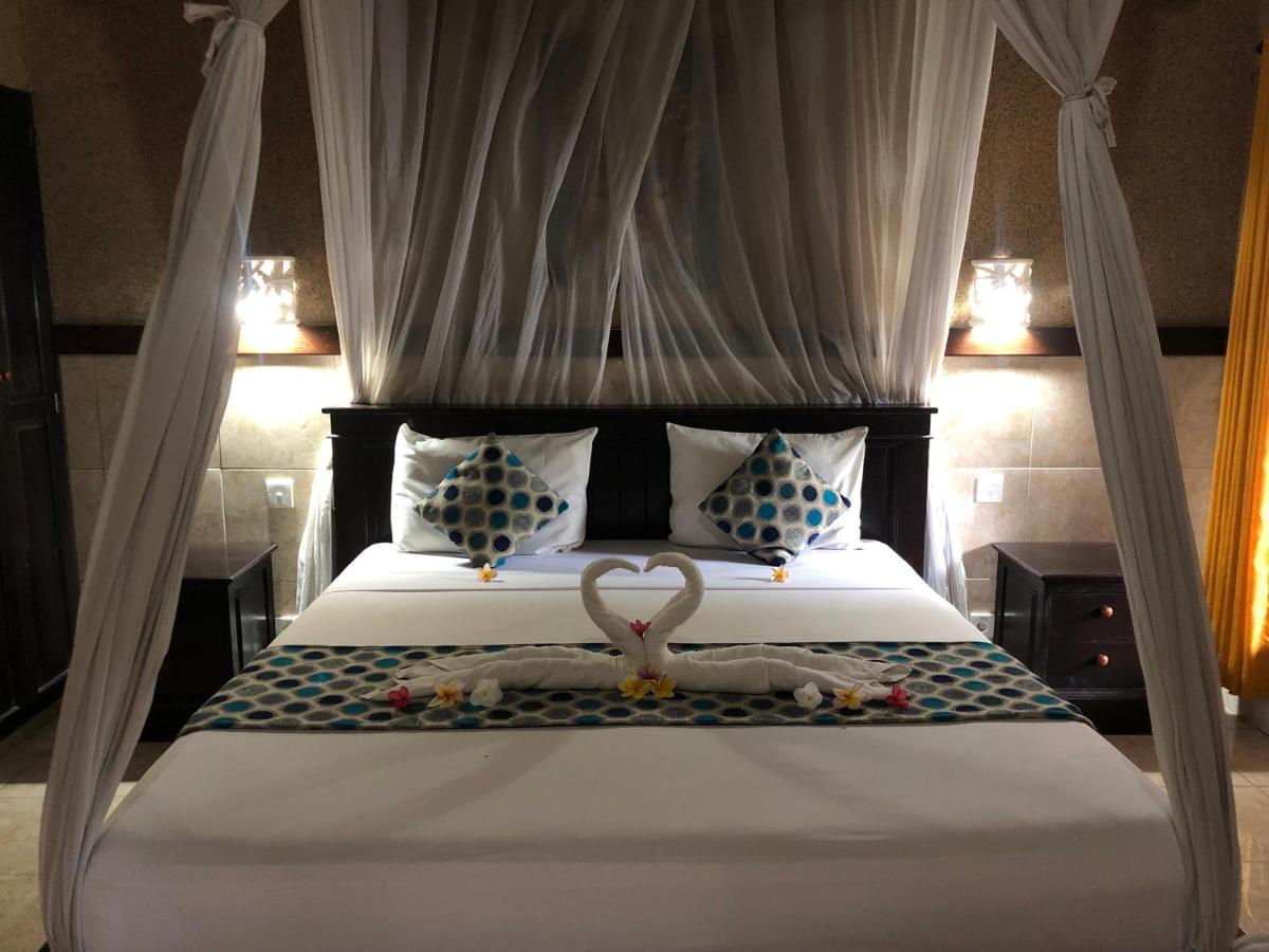 Pondok Shindu Guest House เปมูเตรัน ภายนอก รูปภาพ