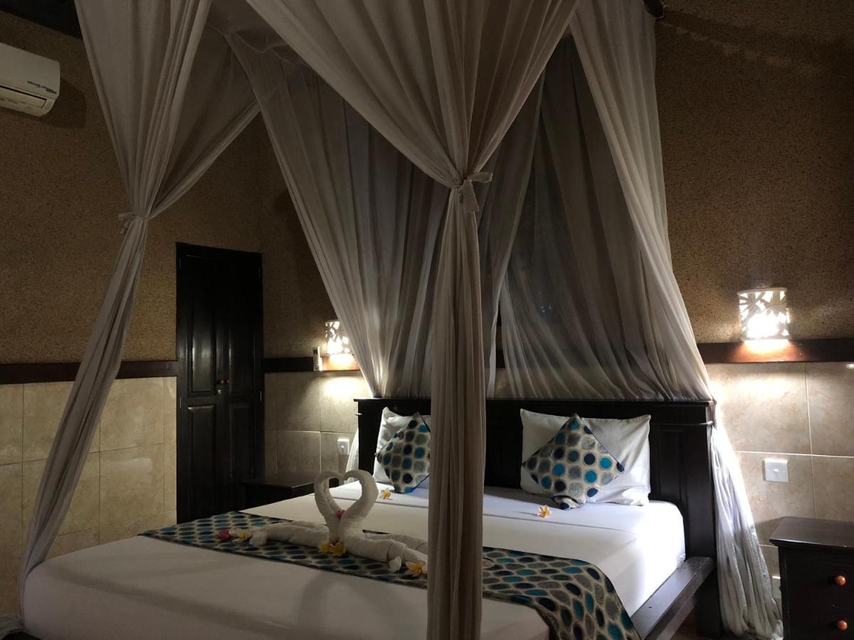 Pondok Shindu Guest House เปมูเตรัน ภายนอก รูปภาพ