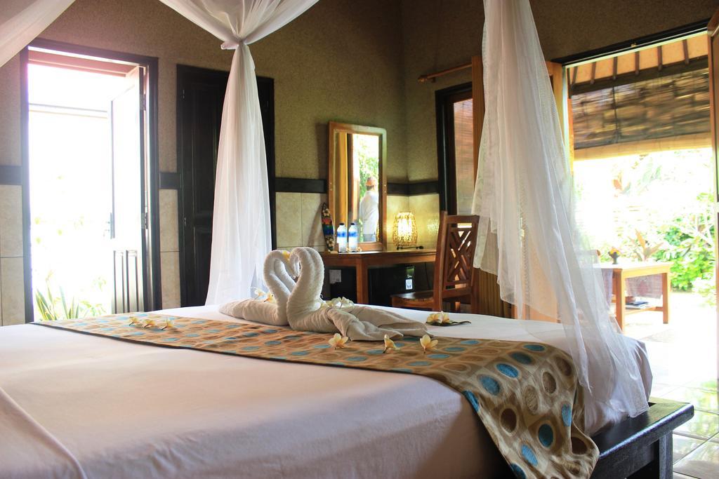 Pondok Shindu Guest House เปมูเตรัน ภายนอก รูปภาพ