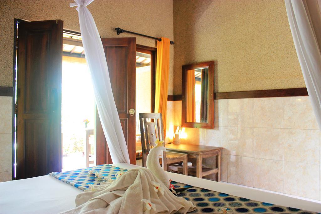 Pondok Shindu Guest House เปมูเตรัน ภายนอก รูปภาพ